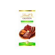 Chocolat au lait, extra-fin, fourré aux pralinés amandes et noisettes, aux éclats de Crêpe Dentelle