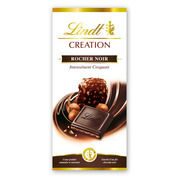 Chocolat noir, extra fin, fourré aux pralinés amandes et noisettes et aux noisettes croustillantes